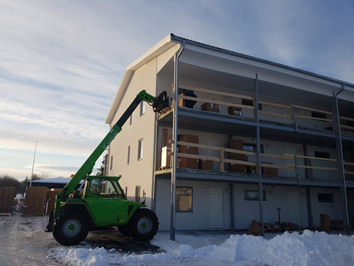 Teleskoplastning åt byggbolag.